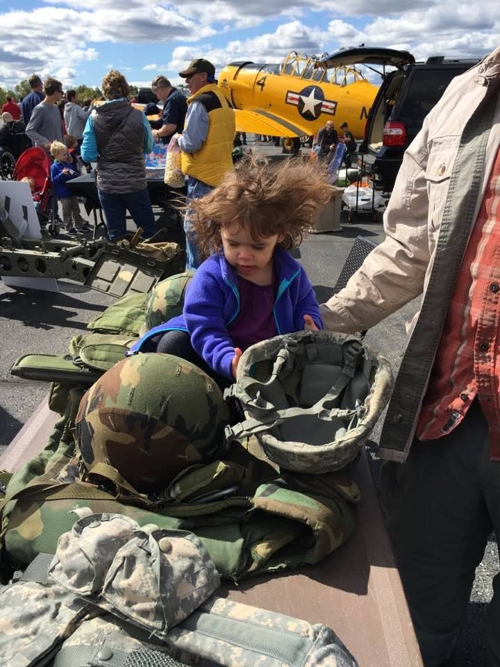 Despite the windy day, children enjoyed interacting with the military gear display and learning about the lives of our service-members.