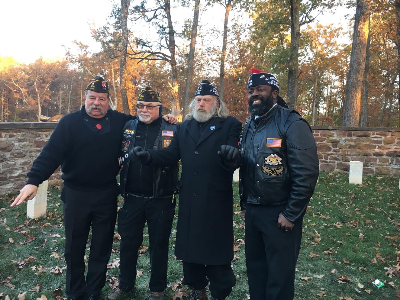 Riders members gather for a photo after the Veterans Day Sunrise Ceremony at Balls Bluff.